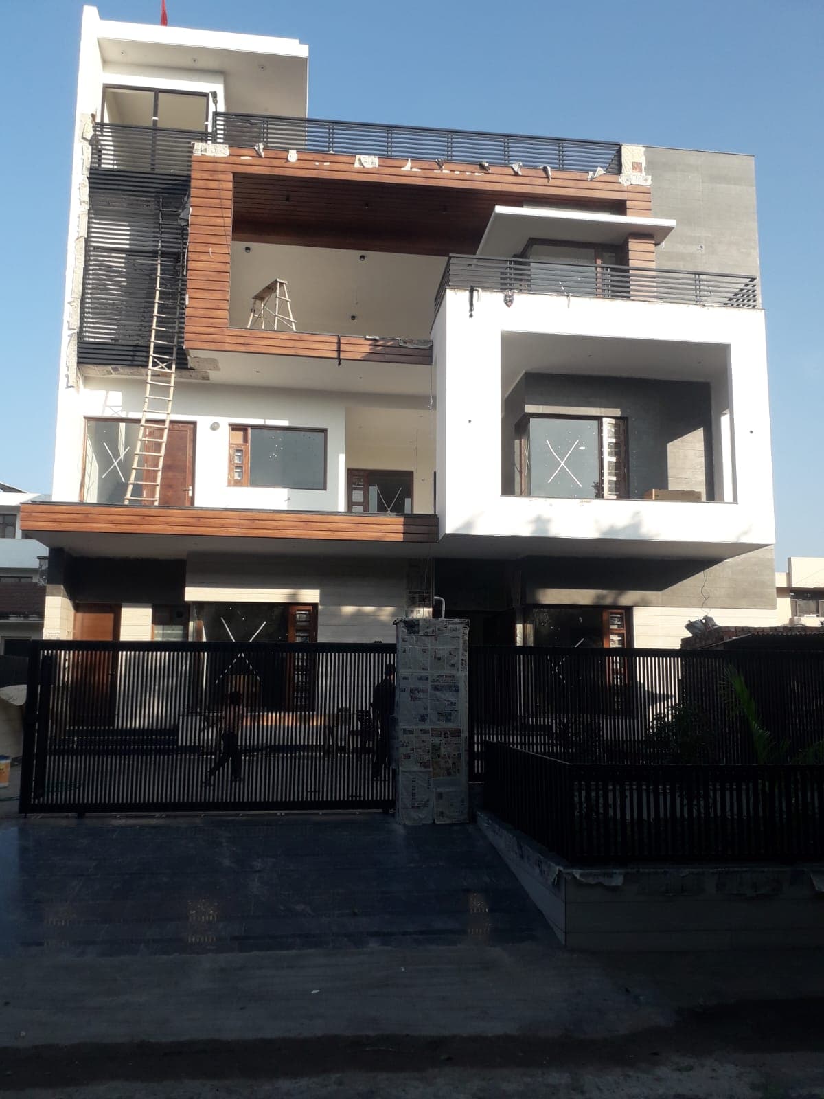 A residence mid-construction, before its transformation
